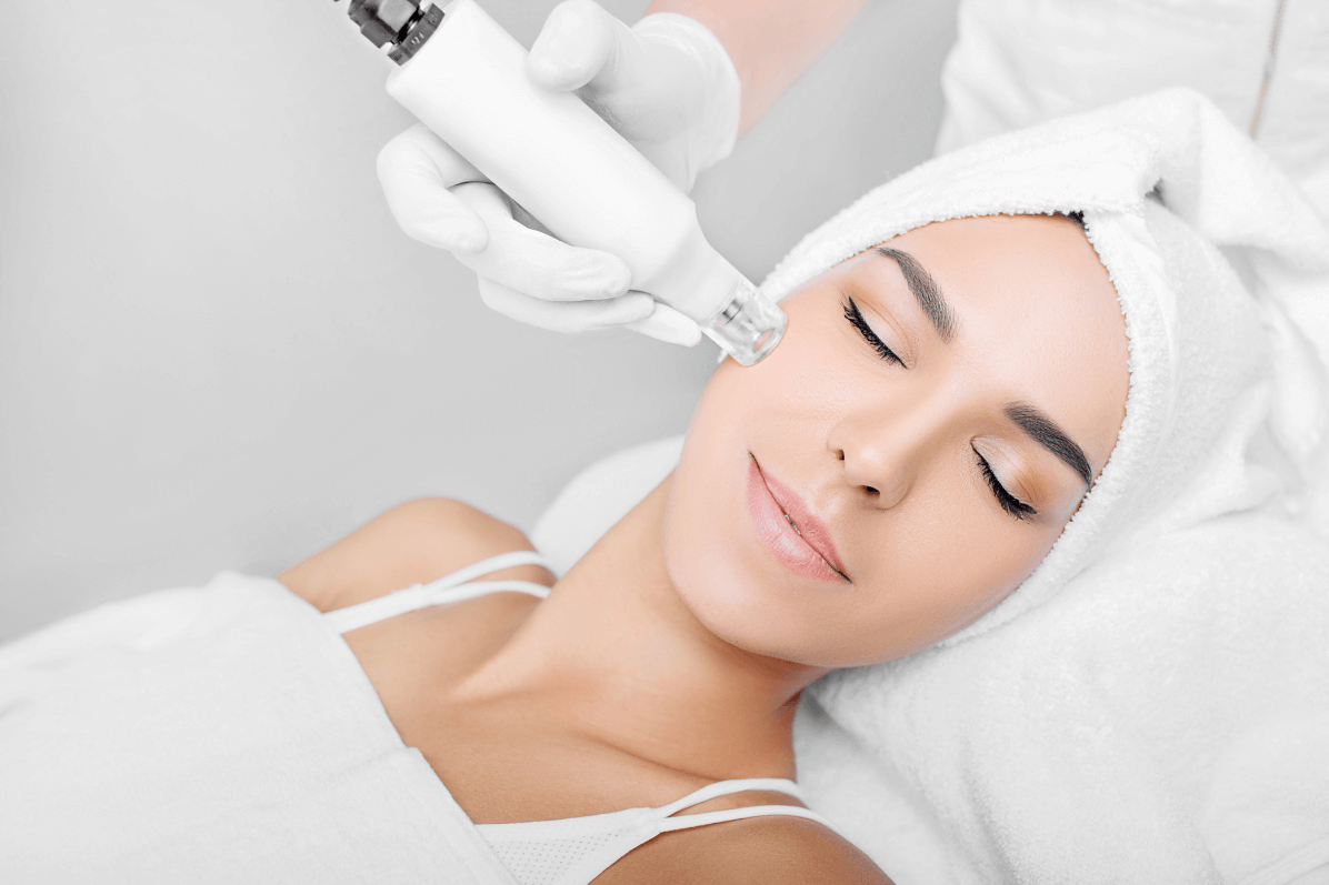 woman receiving HydraFacial on her face at Radlett aesthetic clinic